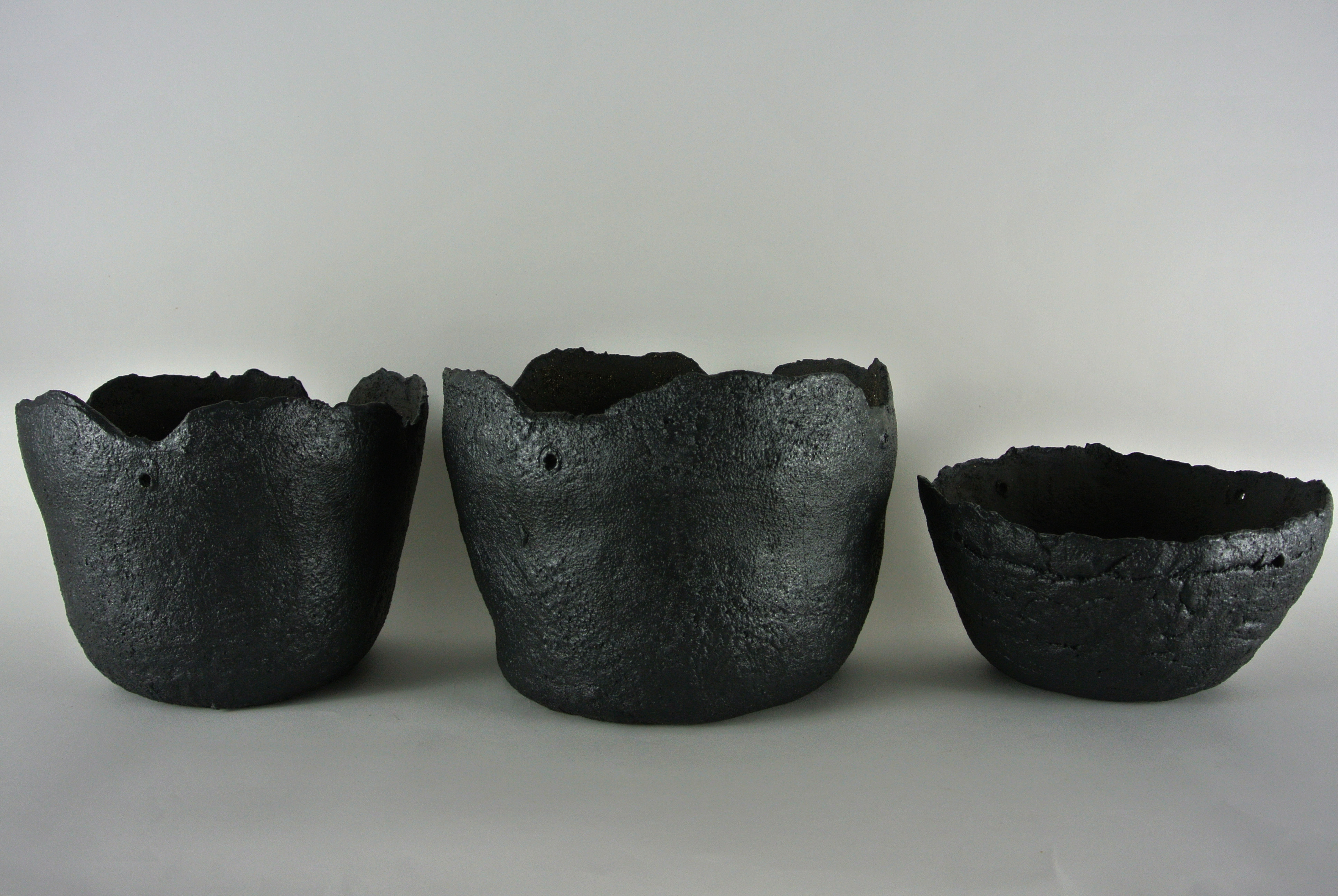 three black planters
